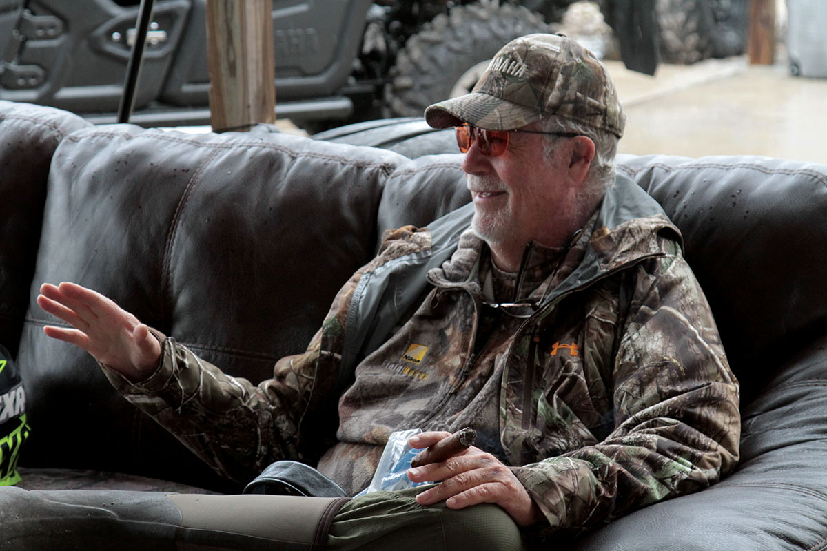 Regardless of how much pork ends up in the ice chest, Dick still celebrates with an end of the day cigar and glass of bourbon.